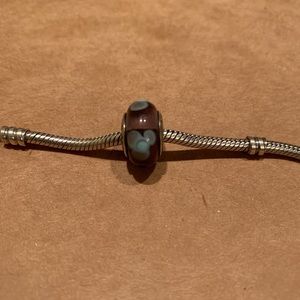 Used Purple and blue floral pandora charm